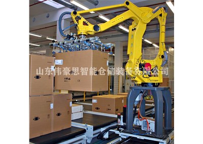 牛奶箱全自動碼垛機 碼垛機器人工作現(xiàn)場
