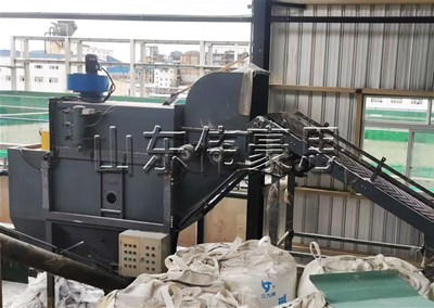 熟料粉自動破袋機是如何工作的？