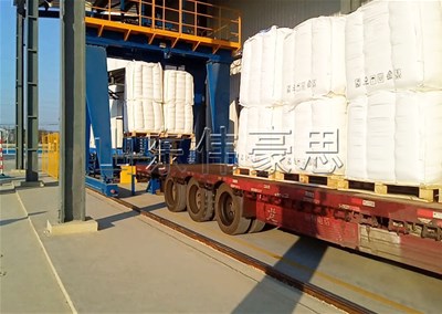 碳酸鈣噸袋自動(dòng)裝車機(jī)是怎樣工作的？